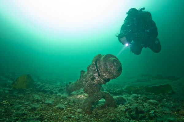 Diver Nick Bowman hovers over the wheel boss on the Robert Kerr wreck (Photo: Ewan Anderson)